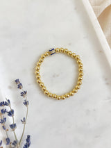 Eye of Protection Gold Ball Bracelet